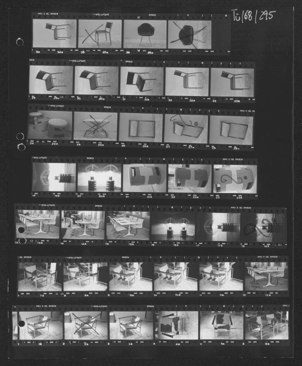 Möbel für "Publik": Kuhfellsesselchen v. Corbusier; Esstisch Ensemble v. Rams, Leuchte v. Maurer, div. Klapp- und Stapelhocker